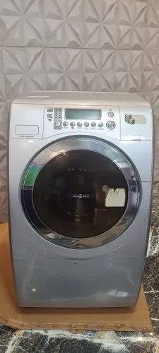 Máquina de lavar roupas lava e seca Brastemp