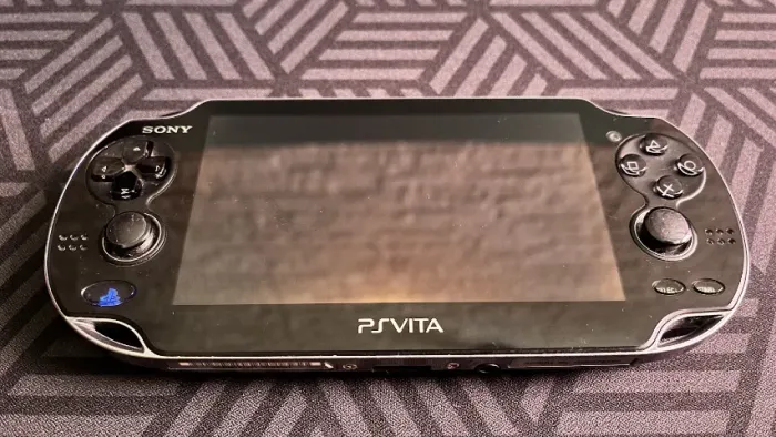 PS Vita PCH-1001 OLED Desbloqueado + microSD 64GB + Acessórios