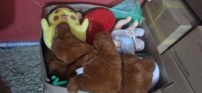 Lote brinquedos e peso de porta