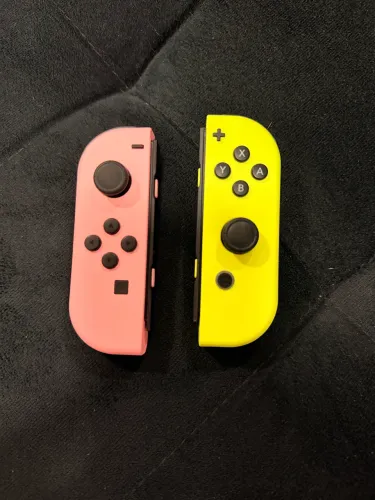 Joy Cons / Nintendo Switch / Amarelo e Rosa