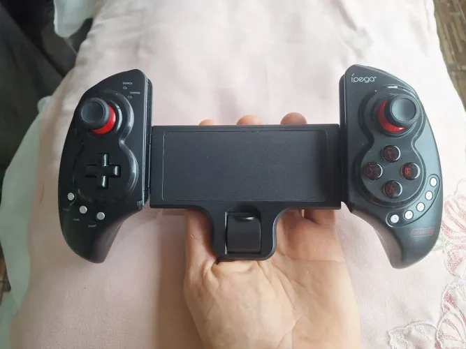 Controle Joystick Ipega PG-9023, gamepad telescópico sem fio para celulares ou tablets.