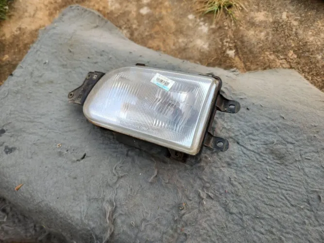 Farol esquerdo Towner 94/97 original