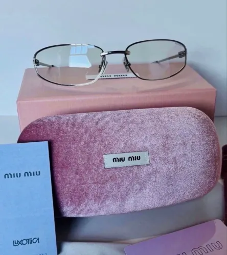 Óculos Miu Miu Smua50 silver