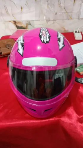 Vendo capacete rosa infantil novo pouco dias de uso número 54