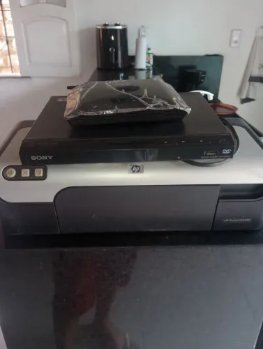 Impressora pra retirada de peças um dvd funcionando norma e um aparelho de Wi-Fi 