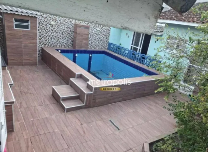 Casa com 4 dormitórios à venda, 130 m² por R$ 920.000,00 - Solemar - Praia Grande/SP