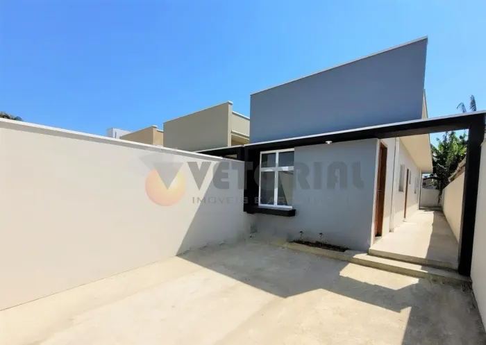 Casa com 2 dormitórios à venda, 60 m² por R$ 410.000,00 - Balneário dos Golfinhos - Caragu