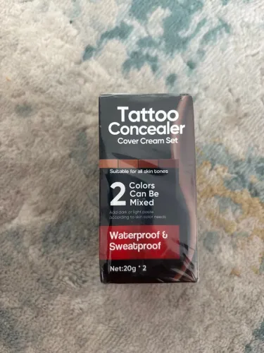 Camuflagem/maquiagem de tatuagem 