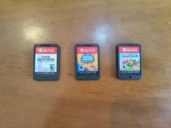 Lote 3 Jogos Switch - Smash Bros + Minecraft + Liga da Justiça