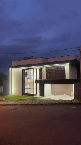 Casa com 4 dormitórios à venda, 411 m² por R$ 2.350.000,00 - Condomínio Reserva Ibirapitan