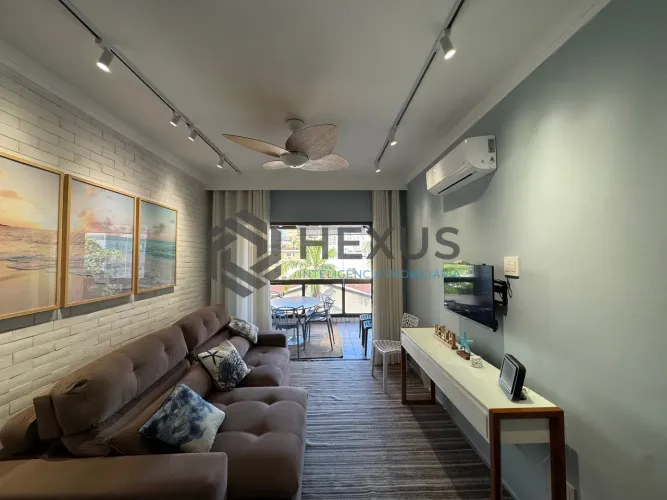 Apartamento reformado e mobiliado com varanda a venda na praia das Asturias, Guaruja