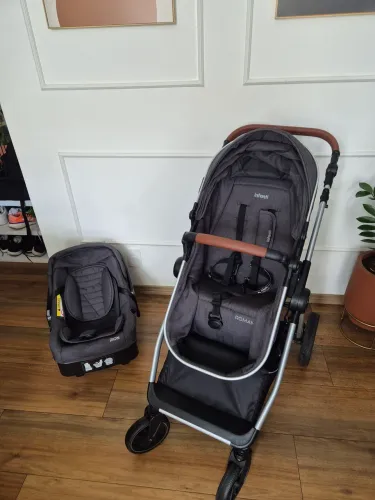 Carrinho com bebe conforto infanti