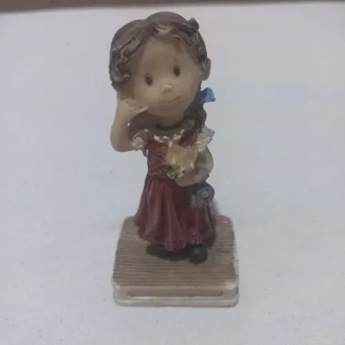 Boneca de resina para enfeite