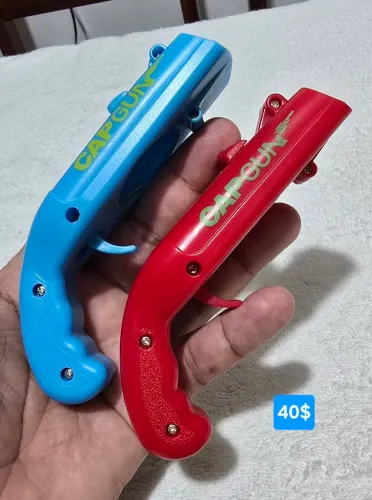 Abridor de garrafas atirador de tampinha