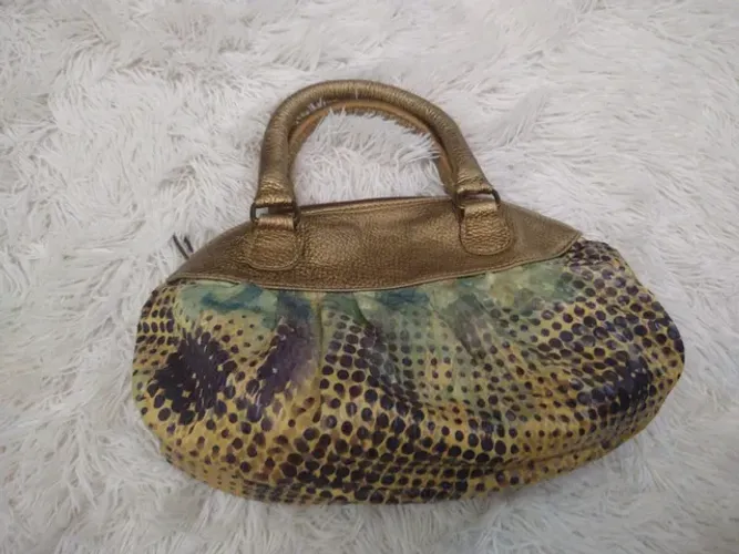 Bolsa em couro ouro velho