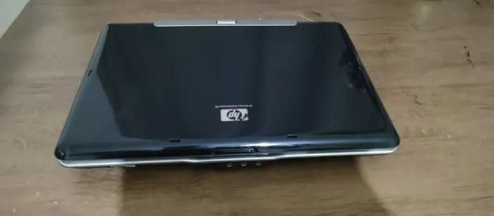 Notebook HP - Preto Pavilion TX1000 - Não liga, mas acende as luzes.