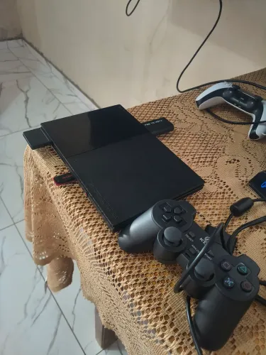 Playstation 2 com jogos no pen drive