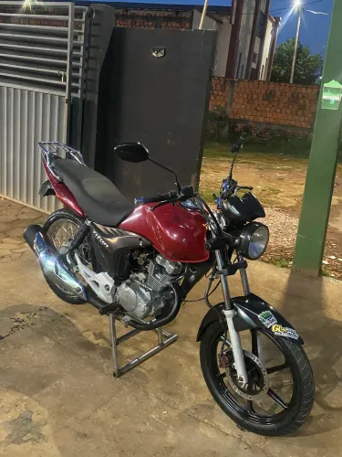Vendo ou troco por carro essa linda titan mix