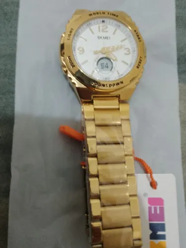 Relógio SKMEI dourado analógico e.digital