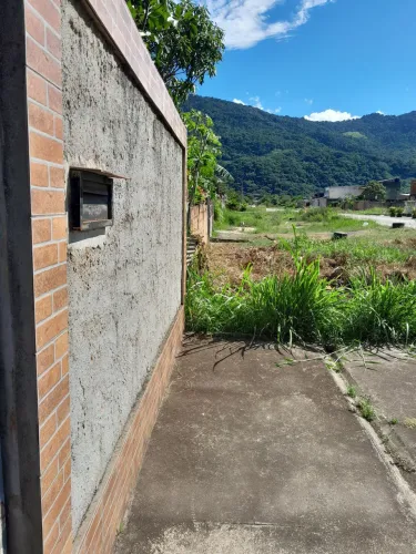Terreno com casa em coroa grande
