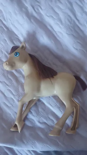 Cavalo de brinquedo e sela rosa 