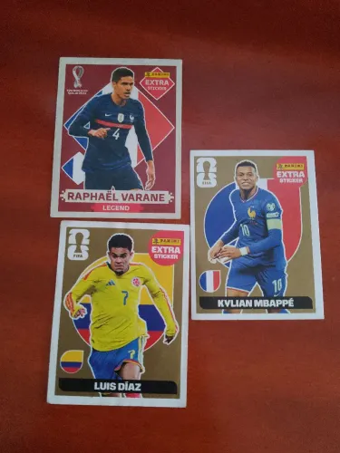 Figurinhas legends da copa kylian mbape ouro Luis dias ouro e Raphael varane base da copa