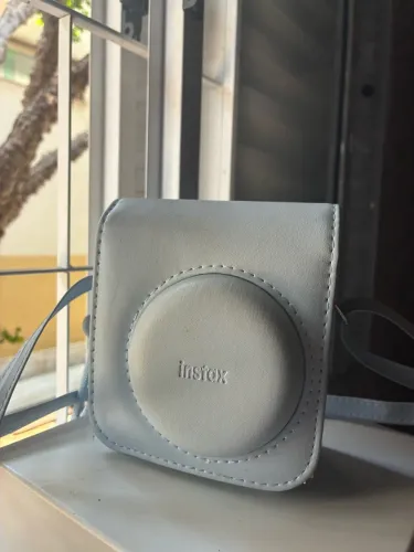 Câmera instax mini 12, acompanha case