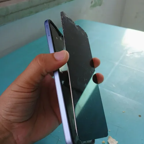 Celular Honnor tela descolada