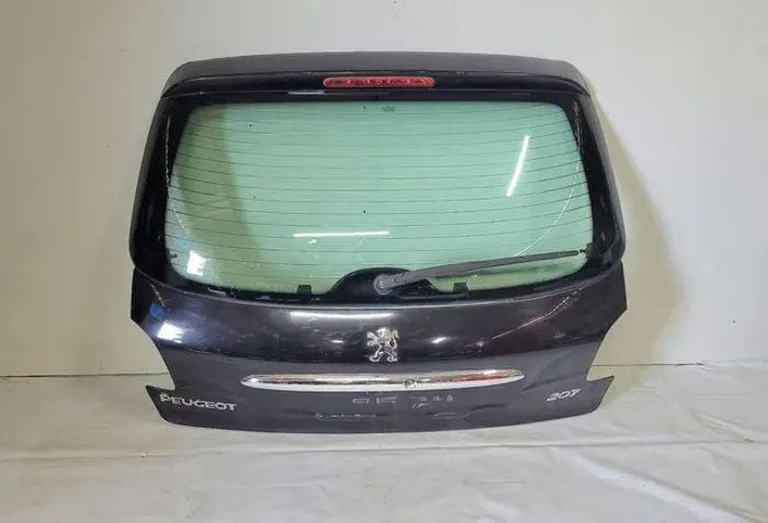 Tampa peugeot 207