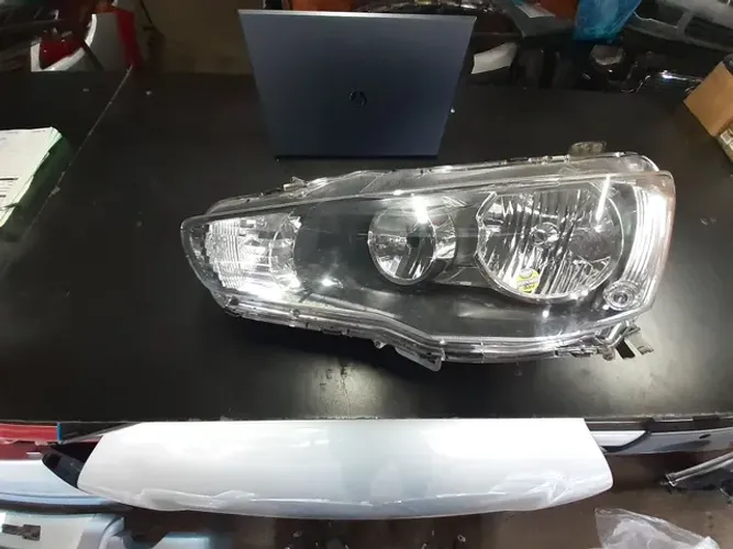 Lancer 2014 farol lado esquerdo
