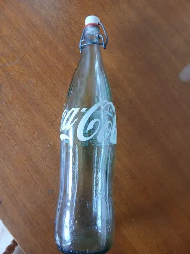 Garrafa coca cola retrato 1l
