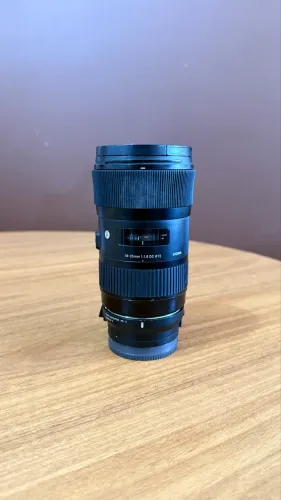 Lente Sigma 18 35 + MC11