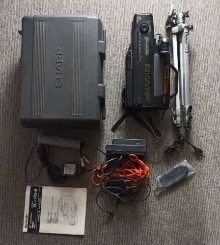 Filmadora profissional antiga sharp completa com maletas e tripé