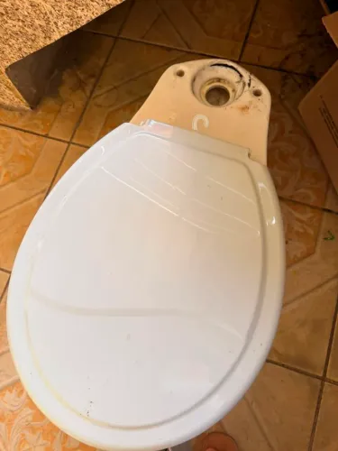 Vaso sanitário Deca aclopado