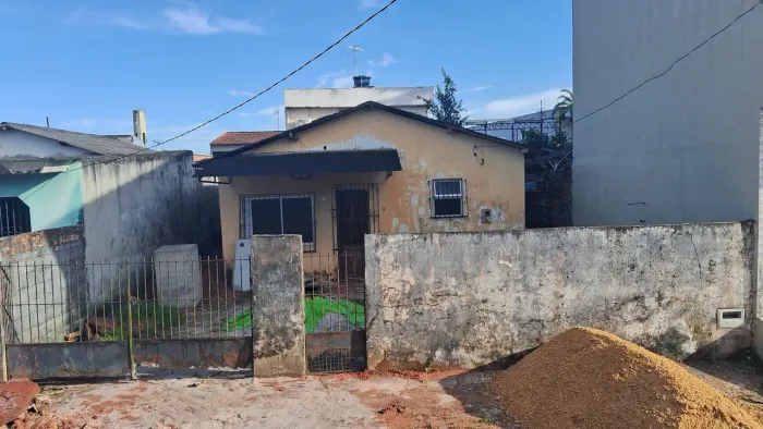 Vendo terreno com casa dentro