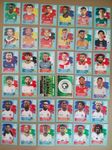 56 figurinhas normais da copa, mais uma brilhante, mais um time perfilado todas novas