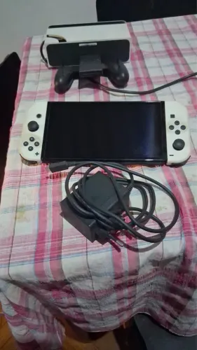 NINTENDO SWITCH OLED 64 gb + CASE
