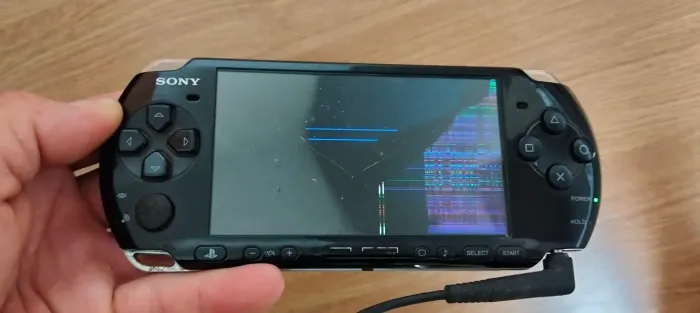 PSP modelo 3001 funcionando destravado tem troca tela