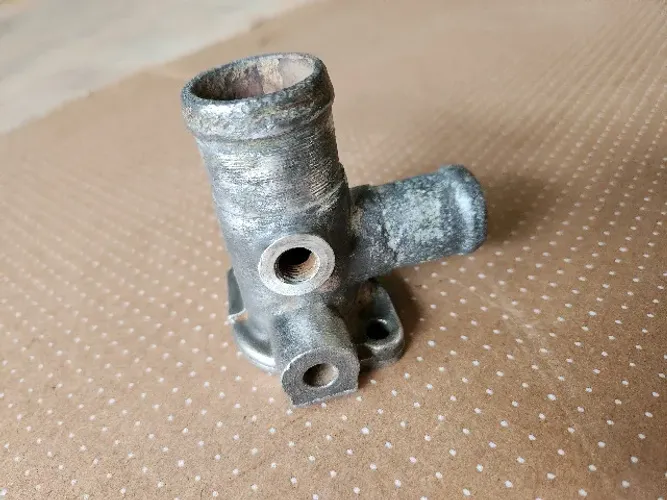 Flange saída água motor AP Gol / Santana