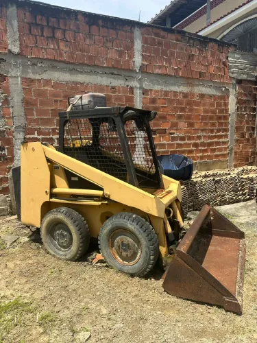 PÁ CARRAGADEIRA (BOBCAT)