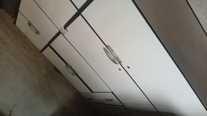 Cama e guarda roupa