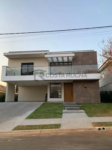 Casa com 4 dormitórios à venda, 445 m² por R$ 3.200.000,00 - Condomínio Portal dos Bandeir
