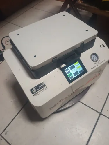 Máquina laminadora e tira bolhas 