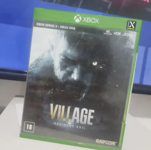 Resident evil village - xbox one | xbox series - mídia física em perfeito estado