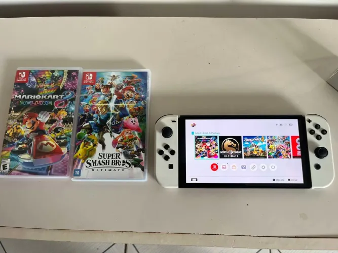 NINTENDO SWITCH OLED ZERO BALA COM DOIS JOGOS