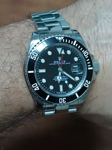 Rolex Perpetual Caixa e Pulseira de Aço. Funcionamento Mecânico. Automático.