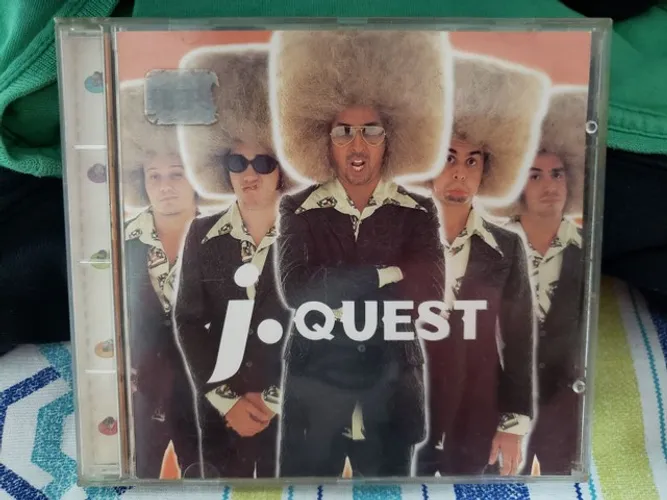 CD J. QUEST 