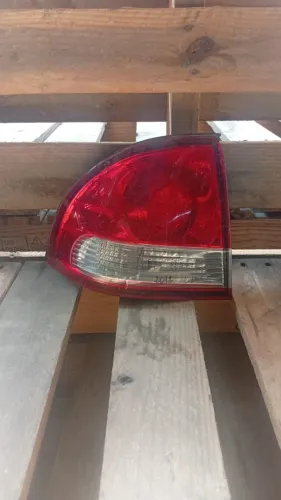 LANTERNA TRASEIRA ESQUERDA CHEVROLET CORSA CLASSIC 11/12 COM DETALHE $100