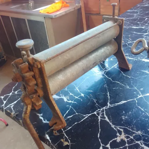 Moedor de café e cilindro de massa