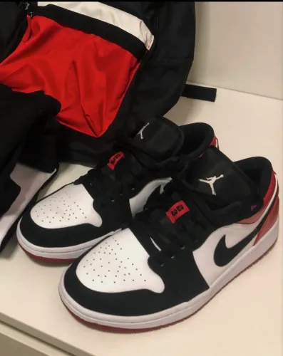 Tênis Jordan 1 Low Black Toe